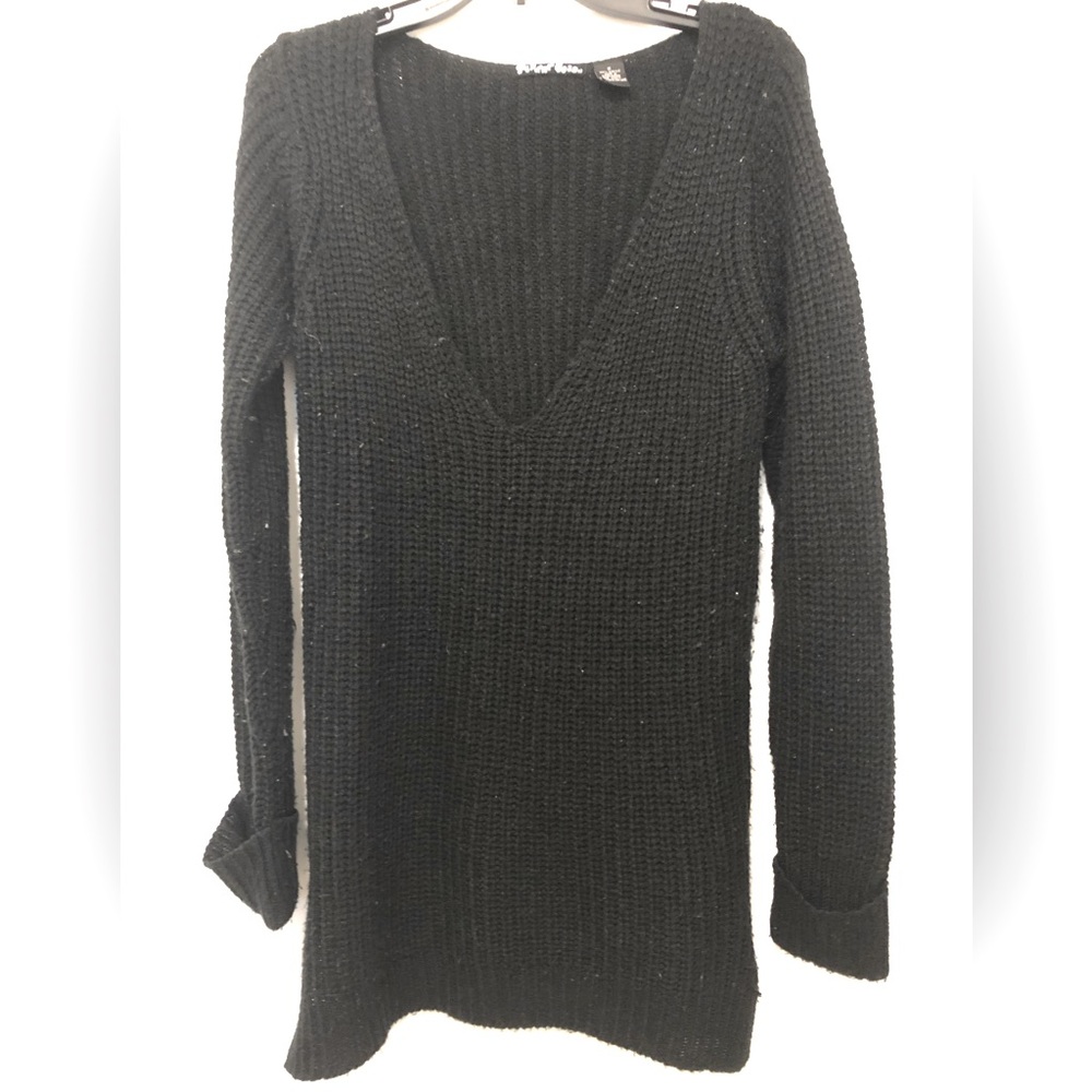Comfy longer Black Vneck sweater with little slits on the sides.